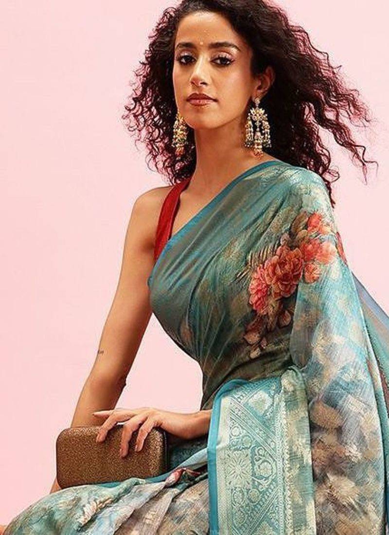 Teal woven cotton blend traditional saree with blouse piece