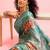 Teal woven cotton blend traditional saree with blouse piece