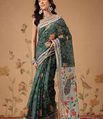 Green printed cotton blend ethnic saree with blouse piece