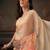 Beige printed tissue traditional saree with blouse piece