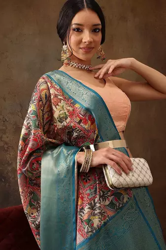 Red printed silk blend ethnic saree with blouse piece