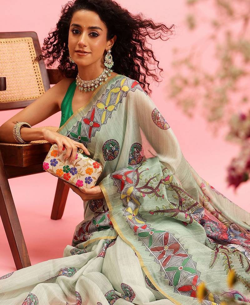 Green printed cotton blend ethnic saree with blouse piece