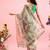Green printed cotton blend ethnic saree with blouse piece