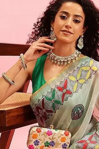 Green printed cotton blend ethnic saree with blouse piece