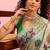Green printed cotton blend ethnic saree with blouse piece