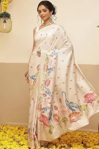 Cream ethnic motifs embroidered art silk festive saree with blouse piece