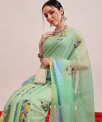Green printed cotton blend ethnic saree with blouse piece 1