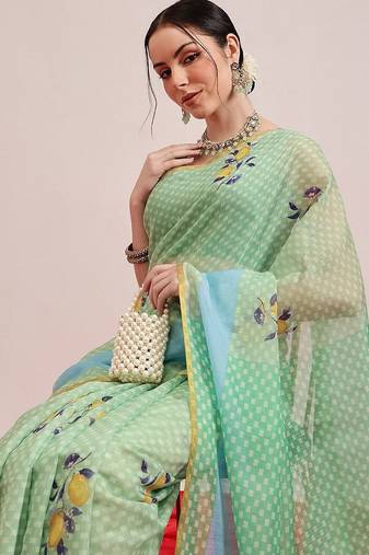 Green printed cotton blend ethnic saree with blouse piece