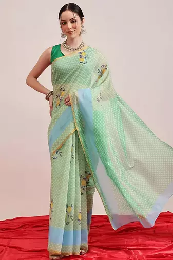 Green printed cotton blend ethnic saree with blouse piece