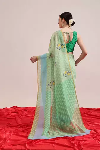 Green printed cotton blend ethnic saree with blouse piece