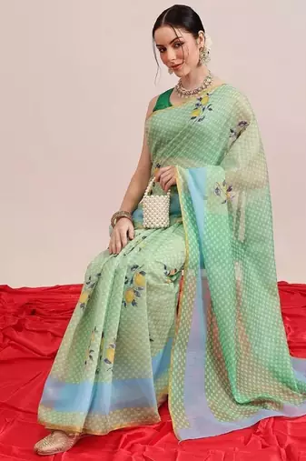 Green printed cotton blend ethnic saree with blouse piece