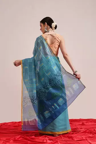 Teal printed cotton blend ethnic saree with blouse piece