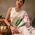 White printed silk blend ethnic saree with blouse piece
