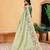 Green printed silk cotton ethnic saree with blouse piece
