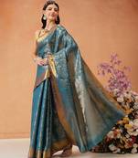 Teal woven silk blend ethnic saree with blouse piece