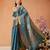 Teal woven silk blend ethnic saree with blouse piece