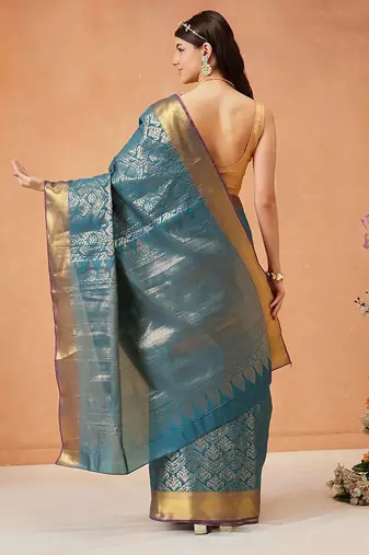 Teal woven silk blend ethnic saree with blouse piece