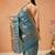Teal woven silk blend ethnic saree with blouse piece