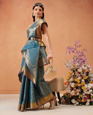 Teal woven silk blend ethnic saree with blouse piece 3