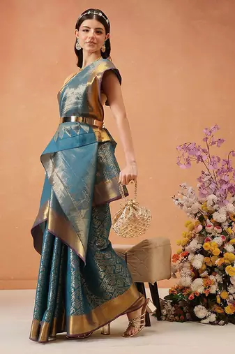 Teal woven silk blend ethnic saree with blouse piece