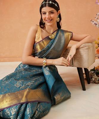 Teal woven silk blend ethnic saree with blouse piece 4