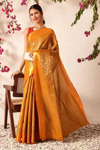 Mustard woven silk blend ethnic saree with blouse piece