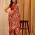 Red printed art silk ethnic saree with blouse piece