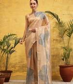 Beige printed tissue traditional saree with blouse piece