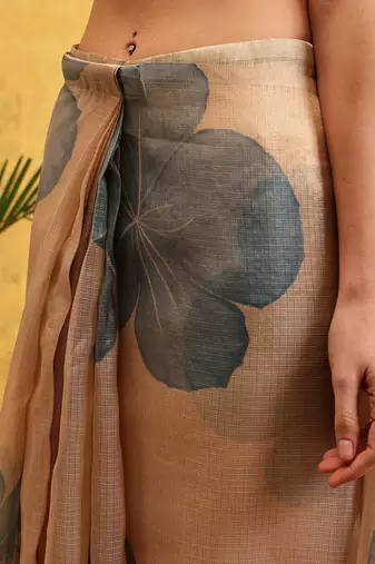 Beige printed tissue traditional saree with blouse piece