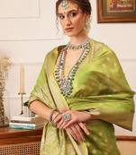 Green woven tissue party wear saree with blouse piece