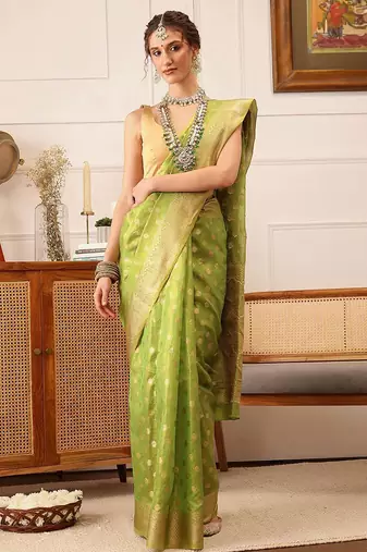 Green woven tissue party wear saree with blouse piece