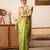 Green woven tissue party wear saree with blouse piece