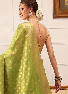 Green woven tissue party wear saree with blouse piece 3