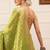 Green woven tissue party wear saree with blouse piece