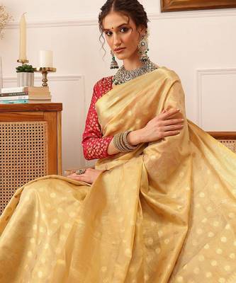 Beige woven tissue party wear saree with blouse piece 1