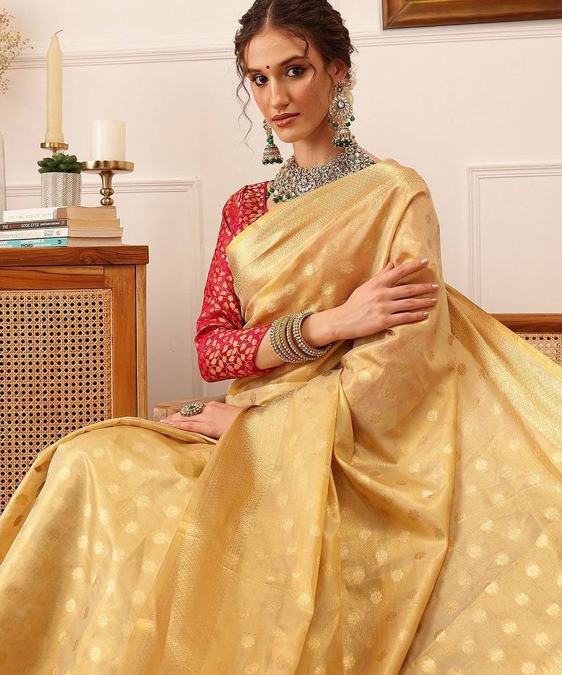 Beige woven tissue party wear saree with blouse piece