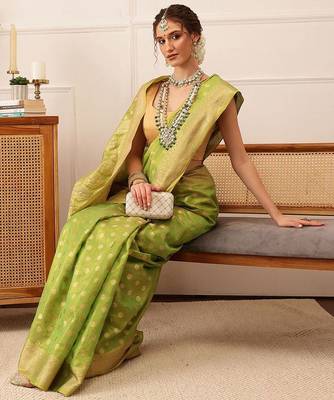 Green woven tissue party wear saree with blouse piece 4