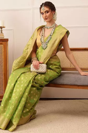 Green woven tissue party wear saree with blouse piece
