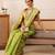 Green woven tissue party wear saree with blouse piece