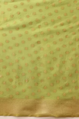 Green woven tissue party wear saree with blouse piece