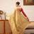 Beige woven tissue party wear saree with blouse piece