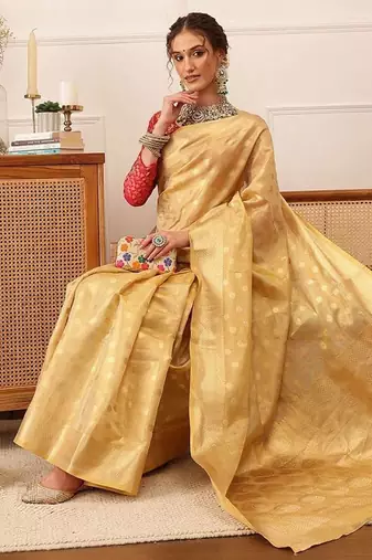 Beige woven tissue party wear saree with blouse piece