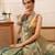 Teal woven tissue party wear saree with blouse piece