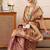 Purple woven tissue party wear saree with blouse piece