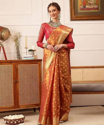 Peach woven tissue party wear saree with blouse piece 2