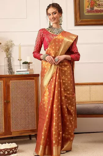 Peach woven tissue party wear saree with blouse piece