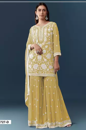 Yellow chiffon semi stitched suit with embroidery thread & khatli work