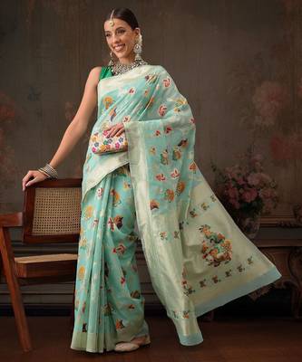 Teal woven pure cotton ethnic saree with blouse piece 1