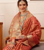 Pink woven tissue party wear saree with blouse piece