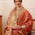 Pink woven tissue party wear saree with blouse piece